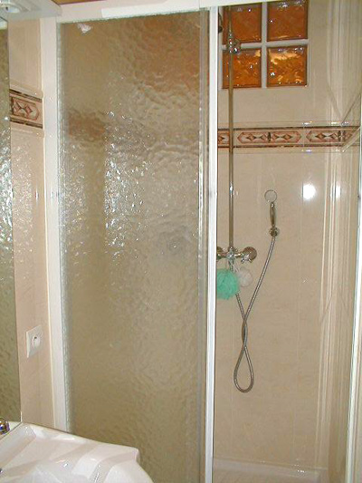 Paris apartment has a brand new redone bathroom with a full American shower.